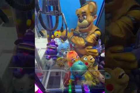 New iPhone Inside Claw Machine 😧 #shorts #clawmachine #arcade #fnaf #fivenightsatfreddys